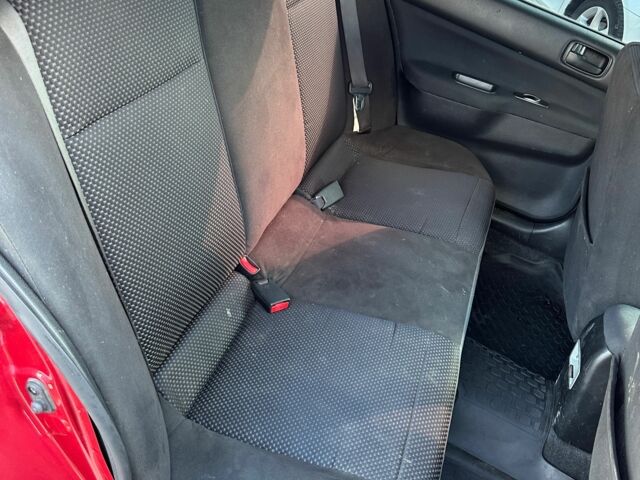 Красный Мицубиси Лансер, объемом двигателя 1.6 л и пробегом 230 тыс. км за 5300 $, фото 5 на Automoto.ua