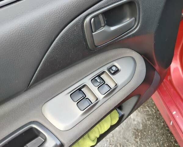 Червоний Міцубісі Lancer, об'ємом двигуна 1.6 л та пробігом 330 тис. км за 4350 $, фото 16 на Automoto.ua