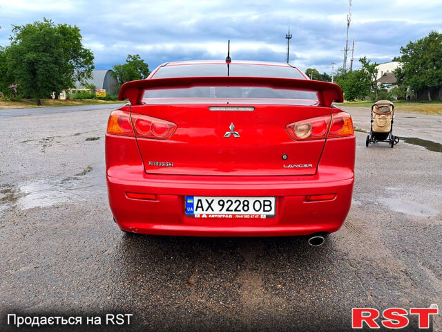 Червоний Міцубісі Lancer, об'ємом двигуна 2 л та пробігом 187 тис. км за 5000 $, фото 4 на Automoto.ua