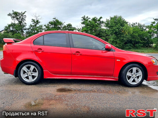 Червоний Міцубісі Lancer, об'ємом двигуна 2 л та пробігом 187 тис. км за 5000 $, фото 3 на Automoto.ua