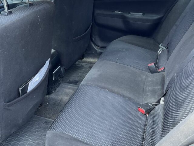 Красный Мицубиси Лансер, объемом двигателя 1.6 л и пробегом 3 тыс. км за 3000 $, фото 4 на Automoto.ua