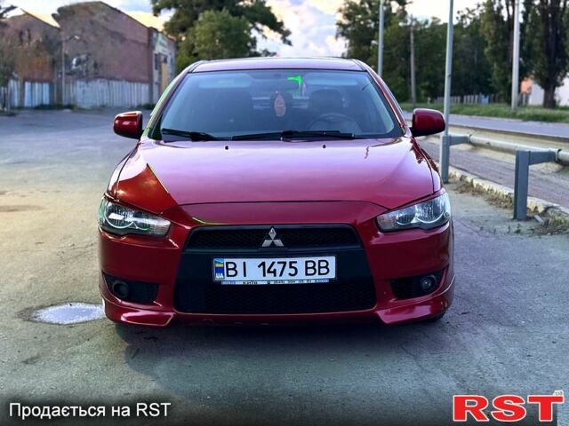 Красный Мицубиси Лансер, объемом двигателя 2 л и пробегом 180 тыс. км за 6500 $, фото 4 на Automoto.ua