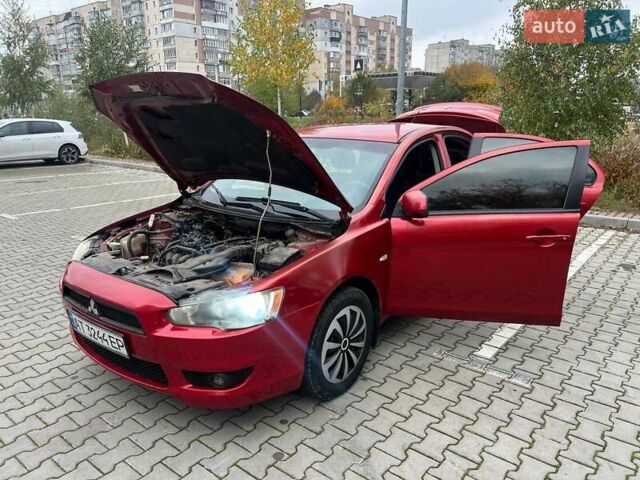 Красный Мицубиси Лансер, объемом двигателя 1.5 л и пробегом 207 тыс. км за 4500 $, фото 7 на Automoto.ua