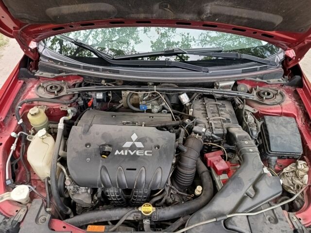 Червоний Міцубісі Lancer, об'ємом двигуна 2 л та пробігом 259 тис. км за 6500 $, фото 5 на Automoto.ua
