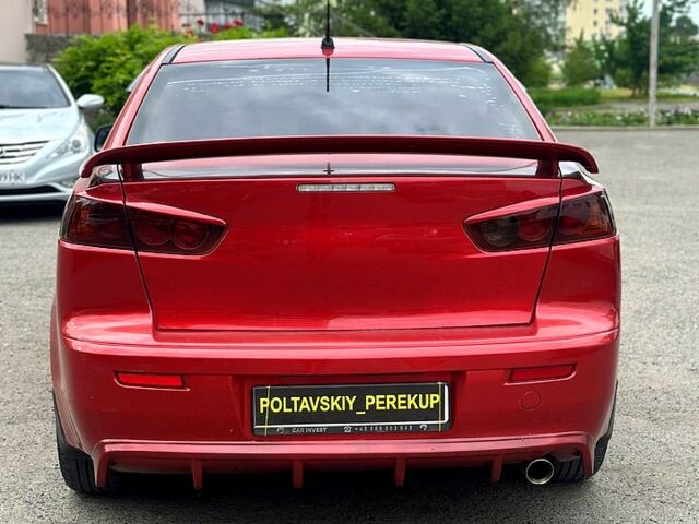 Червоний Міцубісі Lancer, об'ємом двигуна 2 л та пробігом 184 тис. км за 5999 $, фото 3 на Automoto.ua