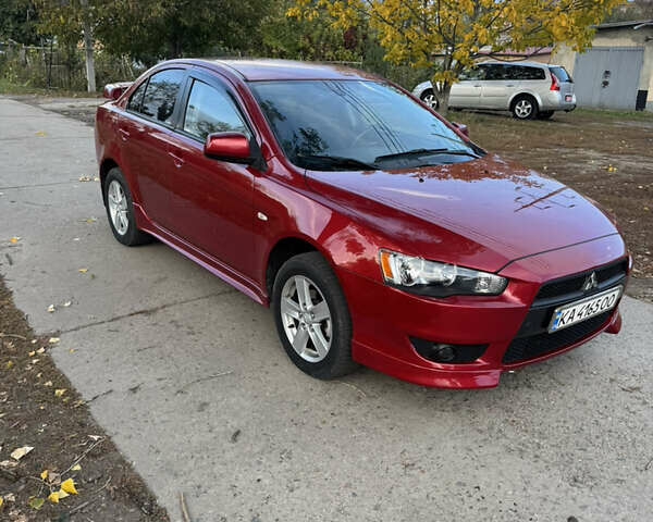 Червоний Міцубісі Lancer, об'ємом двигуна 2 л та пробігом 191 тис. км за 7200 $, фото 1 на Automoto.ua