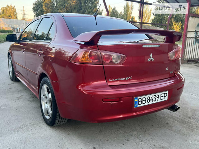 Червоний Міцубісі Lancer, об'ємом двигуна 2 л та пробігом 250 тис. км за 6500 $, фото 11 на Automoto.ua