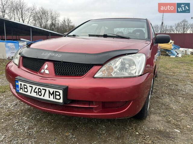Красный Мицубиси Лансер, объемом двигателя 1.58 л и пробегом 280 тыс. км за 3250 $, фото 2 на Automoto.ua