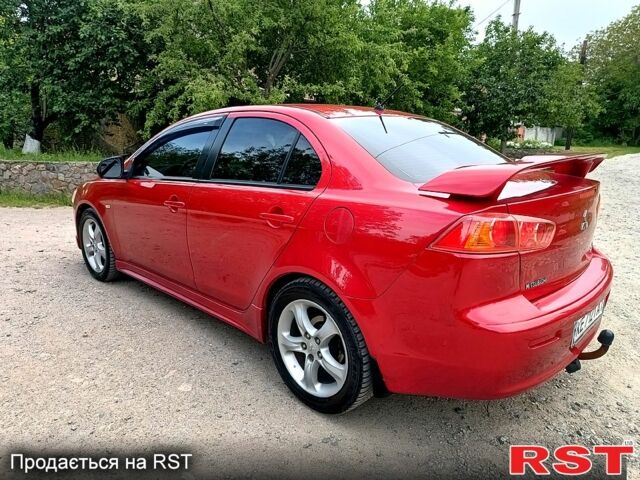 Червоний Міцубісі Lancer, об'ємом двигуна 2 л та пробігом 259 тис. км за 6500 $, фото 2 на Automoto.ua