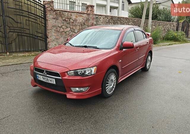 Червоний Міцубісі Lancer, об'ємом двигуна 2 л та пробігом 186 тис. км за 5600 $, фото 3 на Automoto.ua