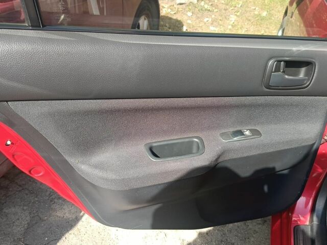 Красный Мицубиси Лансер, объемом двигателя 0 л и пробегом 221 тыс. км за 5500 $, фото 5 на Automoto.ua