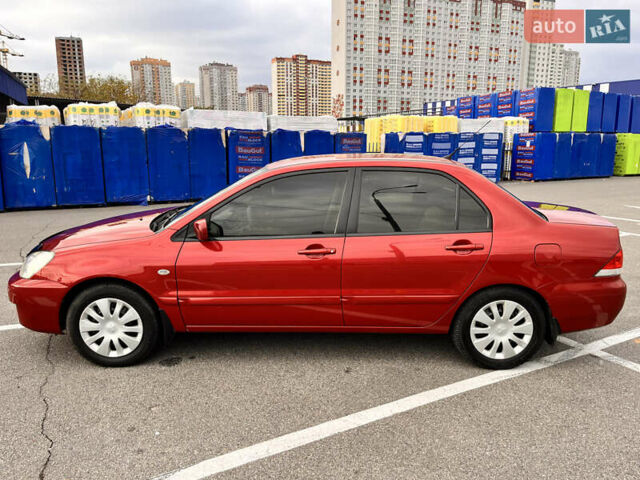 Червоний Міцубісі Lancer, об'ємом двигуна 1.6 л та пробігом 194 тис. км за 5500 $, фото 19 на Automoto.ua