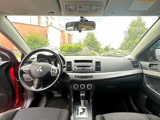 Червоний Міцубісі Lancer, об'ємом двигуна 2 л та пробігом 184 тис. км за 5999 $, фото 7 на Automoto.ua
