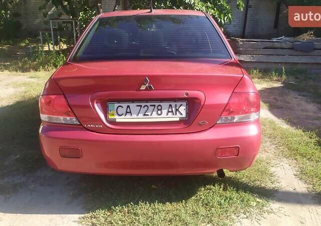Червоний Міцубісі Lancer, об'ємом двигуна 1.58 л та пробігом 280 тис. км за 4300 $, фото 8 на Automoto.ua