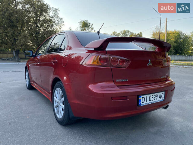 Червоний Міцубісі Lancer, об'ємом двигуна 2 л та пробігом 153 тис. км за 6700 $, фото 2 на Automoto.ua