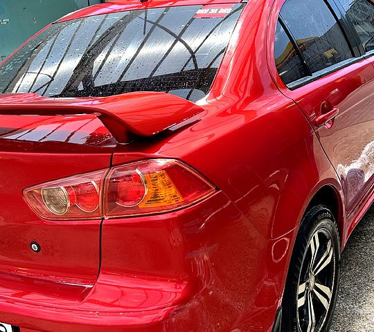 Красный Мицубиси Лансер, объемом двигателя 1.5 л и пробегом 145 тыс. км за 6500 $, фото 3 на Automoto.ua