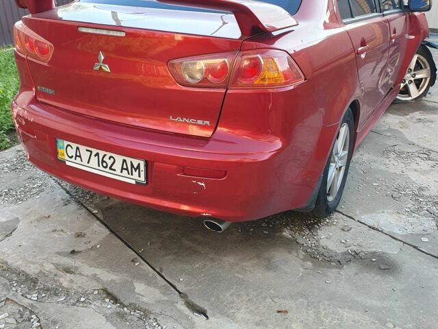 Красный Мицубиси Лансер, объемом двигателя 2 л и пробегом 406 тыс. км за 2750 $, фото 5 на Automoto.ua