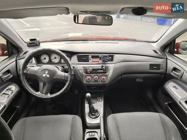 Червоний Міцубісі Lancer, об'ємом двигуна 1.6 л та пробігом 194 тис. км за 5500 $, фото 11 на Automoto.ua