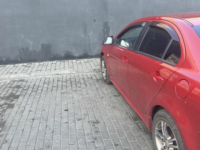 Червоний Міцубісі Lancer, об'ємом двигуна 2 л та пробігом 200 тис. км за 5350 $, фото 7 на Automoto.ua