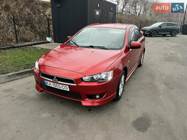 Красный Мицубиси Лансер, объемом двигателя 2 л и пробегом 330 тыс. км за 5250 $, фото 21 на Automoto.ua