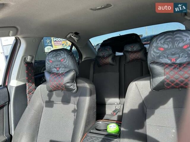 Красный Мицубиси Лансер, объемом двигателя 2 л и пробегом 227 тыс. км за 7000 $, фото 18 на Automoto.ua