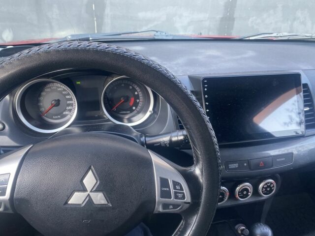 Червоний Міцубісі Lancer, об'ємом двигуна 2 л та пробігом 200 тис. км за 5350 $, фото 2 на Automoto.ua