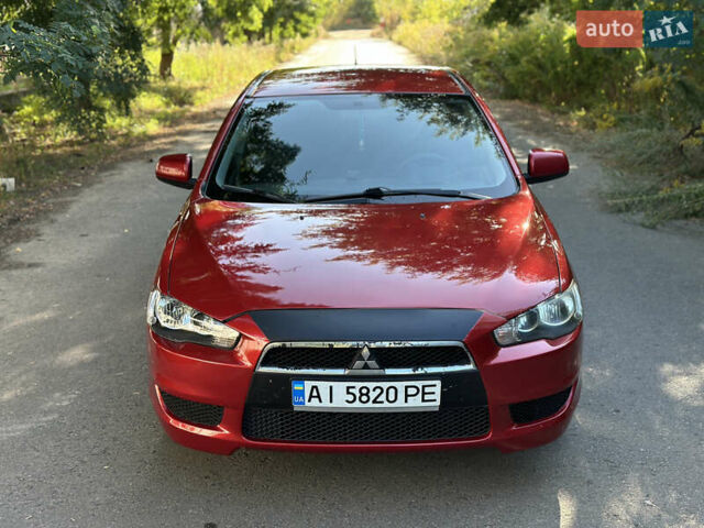 Красный Мицубиси Лансер, объемом двигателя 1.5 л и пробегом 265 тыс. км за 6200 $, фото 13 на Automoto.ua