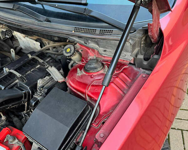 Красный Мицубиси Лансер, объемом двигателя 2 л и пробегом 143 тыс. км за 5200 $, фото 14 на Automoto.ua