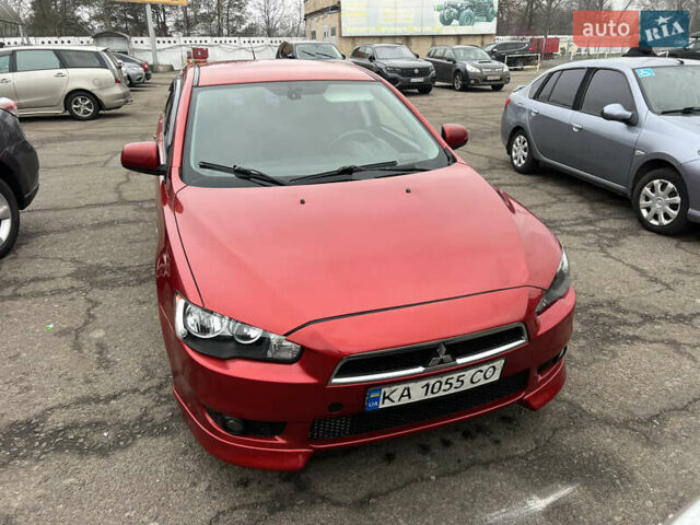 Красный Мицубиси Лансер, объемом двигателя 2 л и пробегом 330 тыс. км за 5250 $, фото 13 на Automoto.ua