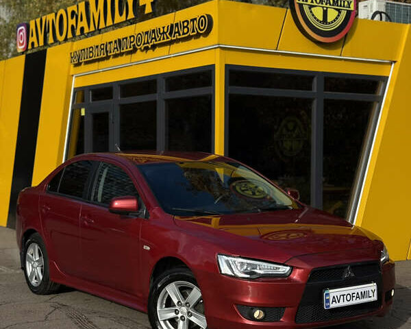 Червоний Міцубісі Lancer, об'ємом двигуна 2 л та пробігом 215 тис. км за 6500 $, фото 2 на Automoto.ua