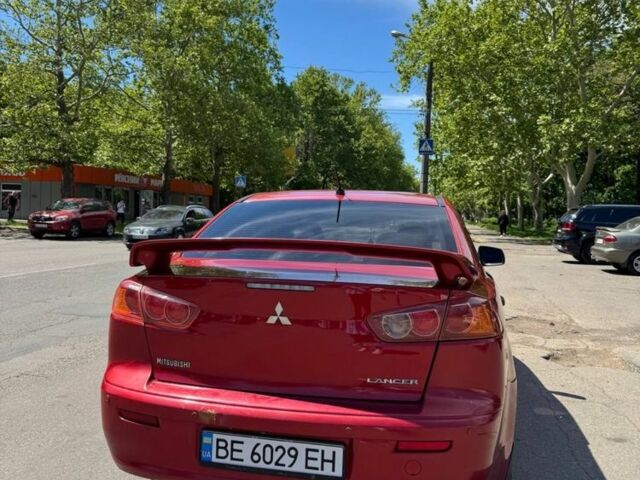 Червоний Міцубісі Lancer, об'ємом двигуна 2 л та пробігом 255 тис. км за 5200 $, фото 1 на Automoto.ua