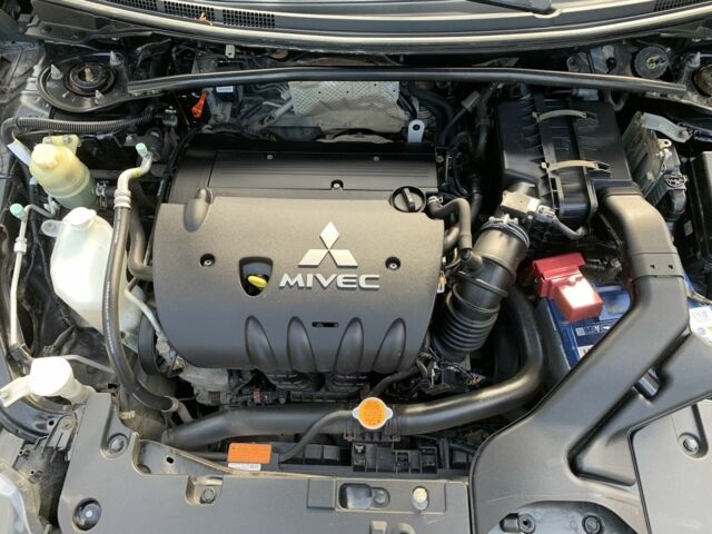 Мицубиси Лансер 2008 в Полтаве на Automoto.ua Красный Мицубиси Лансер, объемом двигателя 2 л и пробегом 170 тыс. км за 7200 $, фото 4 на Automoto.ua