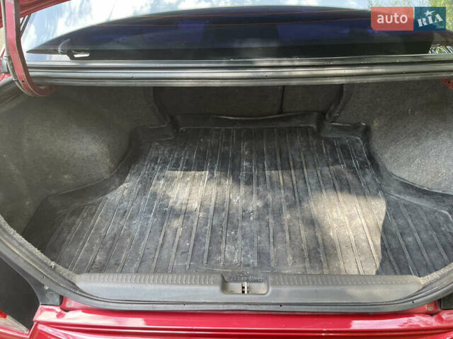 Червоний Міцубісі Lancer, об'ємом двигуна 1.6 л та пробігом 270 тис. км за 5699 $, фото 61 на Automoto.ua