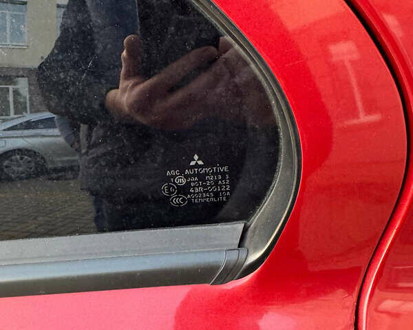 Красный Мицубиси Лансер, объемом двигателя 2 л и пробегом 143 тыс. км за 5200 $, фото 22 на Automoto.ua