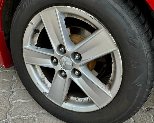 Красный Мицубиси Лансер, объемом двигателя 2 л и пробегом 365 тыс. км за 5000 $, фото 36 на Automoto.ua