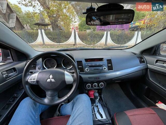 Мицубиси Лансер 2008 в Николаеве на Automoto.ua Красный Мицубиси Лансер, объемом двигателя 1.5 л и пробегом 120 тыс. км за 7000 $, фото 9 на Automoto.ua