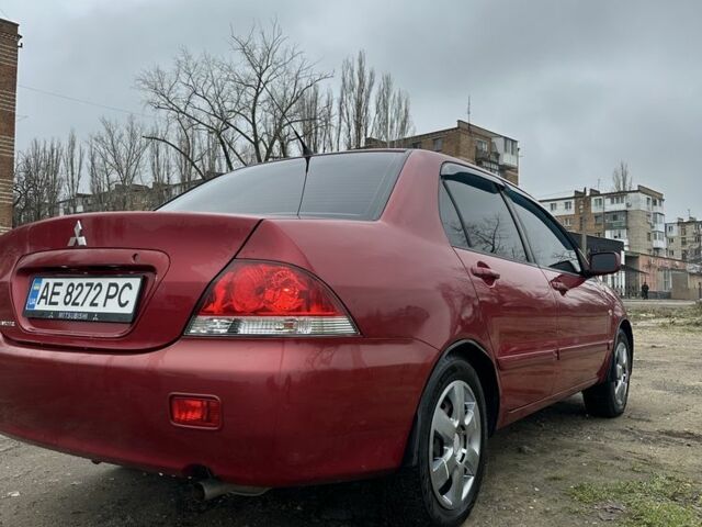 Червоний Міцубісі Lancer, об'ємом двигуна 1.6 л та пробігом 224 тис. км за 4300 $, фото 3 на Automoto.ua