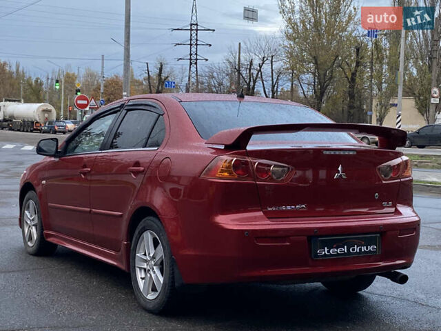 Красный Мицубиси Лансер, объемом двигателя 1.5 л и пробегом 120 тыс. км за 7699 $, фото 5 на Automoto.ua