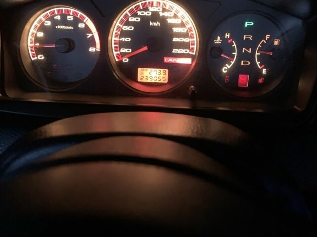 Красный Мицубиси Лансер, объемом двигателя 1.6 л и пробегом 230 тыс. км за 3000 $, фото 1 на Automoto.ua