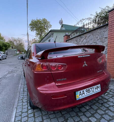 Міцубісі Lancer 2008 у Києві на Automoto.ua Червоний Міцубісі Lancer, об'ємом двигуна 2 л та пробігом 250 тис. км за 7000 $, фото 4 на Automoto.ua