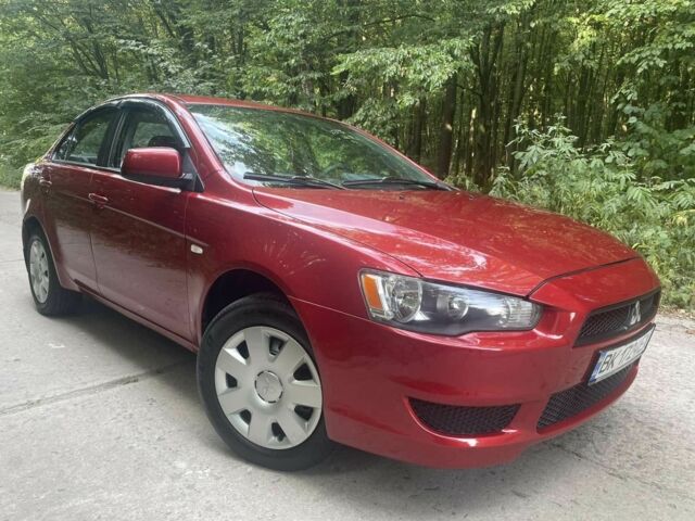 Красный Мицубиси Лансер, объемом двигателя 1.5 л и пробегом 124 тыс. км за 6300 $, фото 3 на Automoto.ua