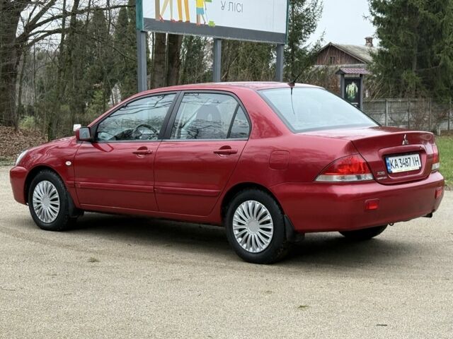 Червоний Міцубісі Lancer, об'ємом двигуна 1.6 л та пробігом 220 тис. км за 4600 $, фото 4 на Automoto.ua