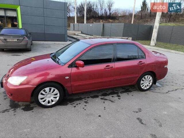 Червоний Міцубісі Lancer, об'ємом двигуна 1.58 л та пробігом 140 тис. км за 6000 $, фото 18 на Automoto.ua
