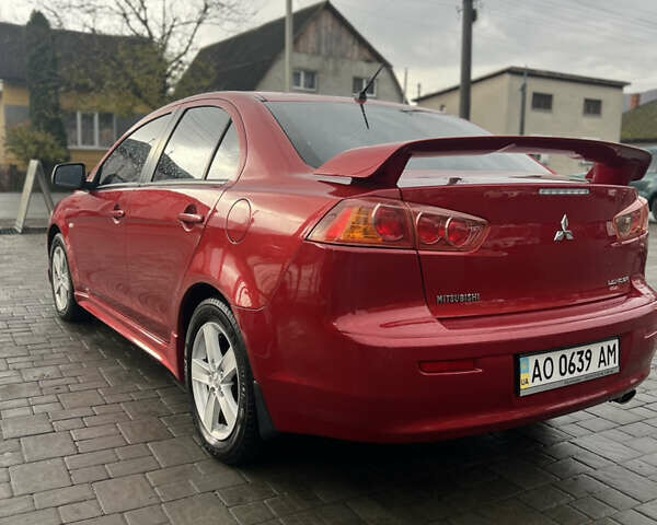 Червоний Міцубісі Lancer, об'ємом двигуна 2 л та пробігом 150 тис. км за 7000 $, фото 6 на Automoto.ua