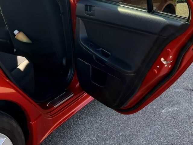 Красный Мицубиси Лансер, объемом двигателя 2 л и пробегом 110 тыс. км за 7500 $, фото 21 на Automoto.ua