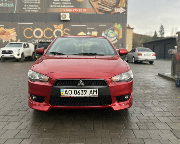 Червоний Міцубісі Lancer, об'ємом двигуна 2 л та пробігом 150 тис. км за 7000 $, фото 1 на Automoto.ua