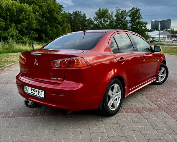 Красный Мицубиси Лансер, объемом двигателя 2 л и пробегом 365 тыс. км за 5000 $, фото 3 на Automoto.ua