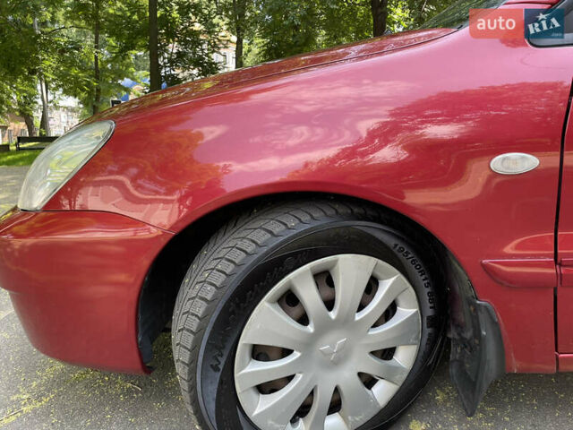 Червоний Міцубісі Lancer, об'ємом двигуна 1.6 л та пробігом 270 тис. км за 5699 $, фото 11 на Automoto.ua