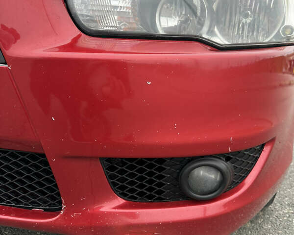 Червоний Міцубісі Lancer, об'ємом двигуна 2 л та пробігом 366 тис. км за 6500 $, фото 30 на Automoto.ua