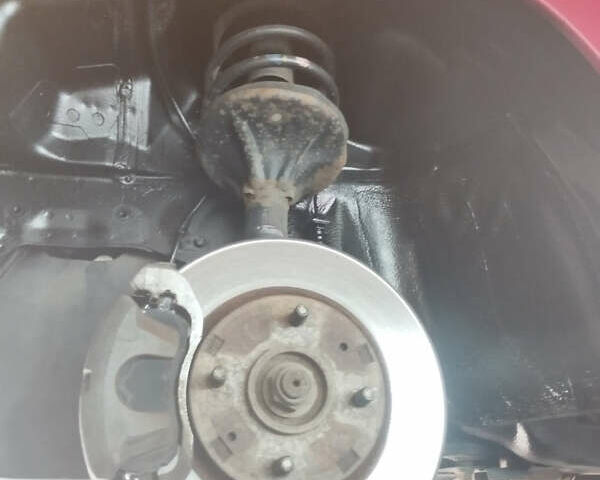 Красный Мицубиси Лансер, объемом двигателя 1.6 л и пробегом 192 тыс. км за 5999 $, фото 14 на Automoto.ua